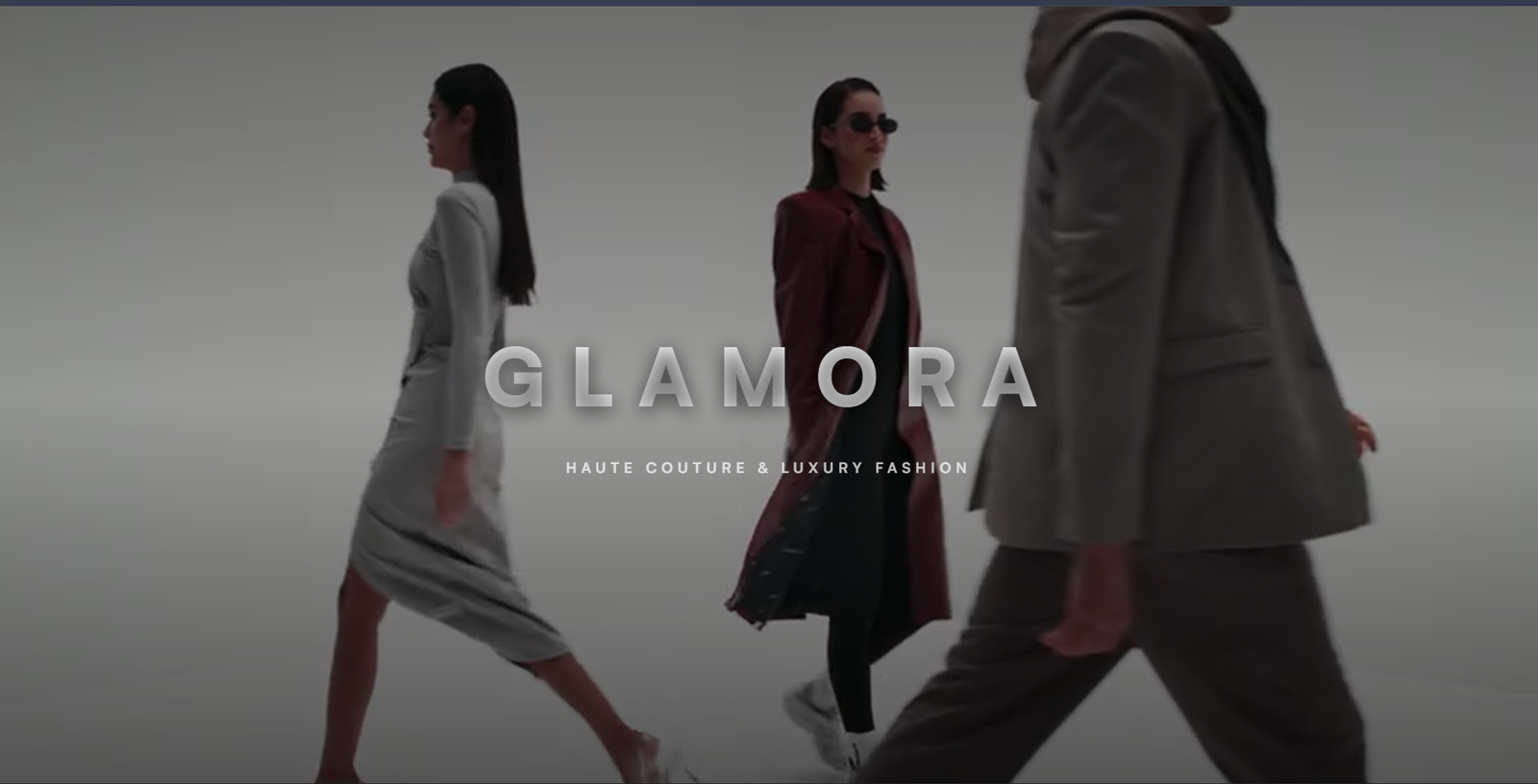 Glamora haute couture and luxury fashion website hero with a runway film backdrop